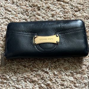 Michael Kors black wallet Used but in good condition